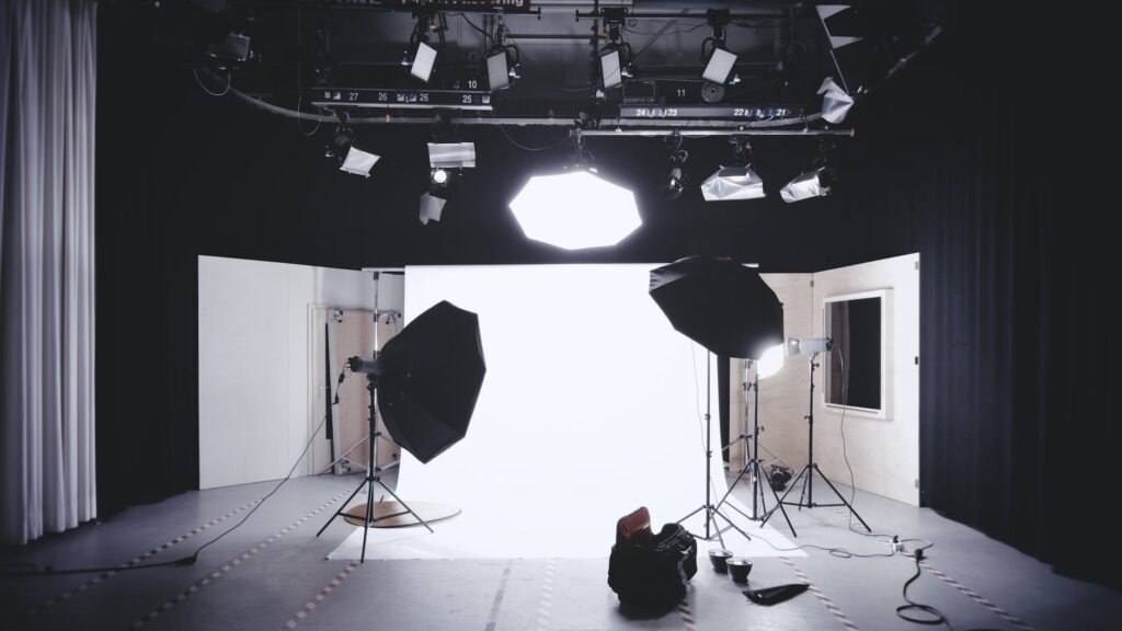 photo studio with white wooden framed wall mirror